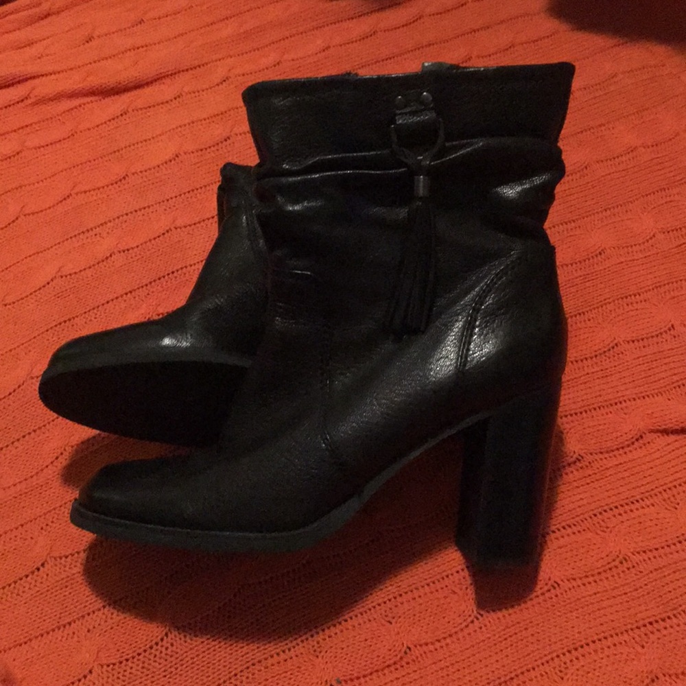Fierce black bootie!  Leather with tassel detail.